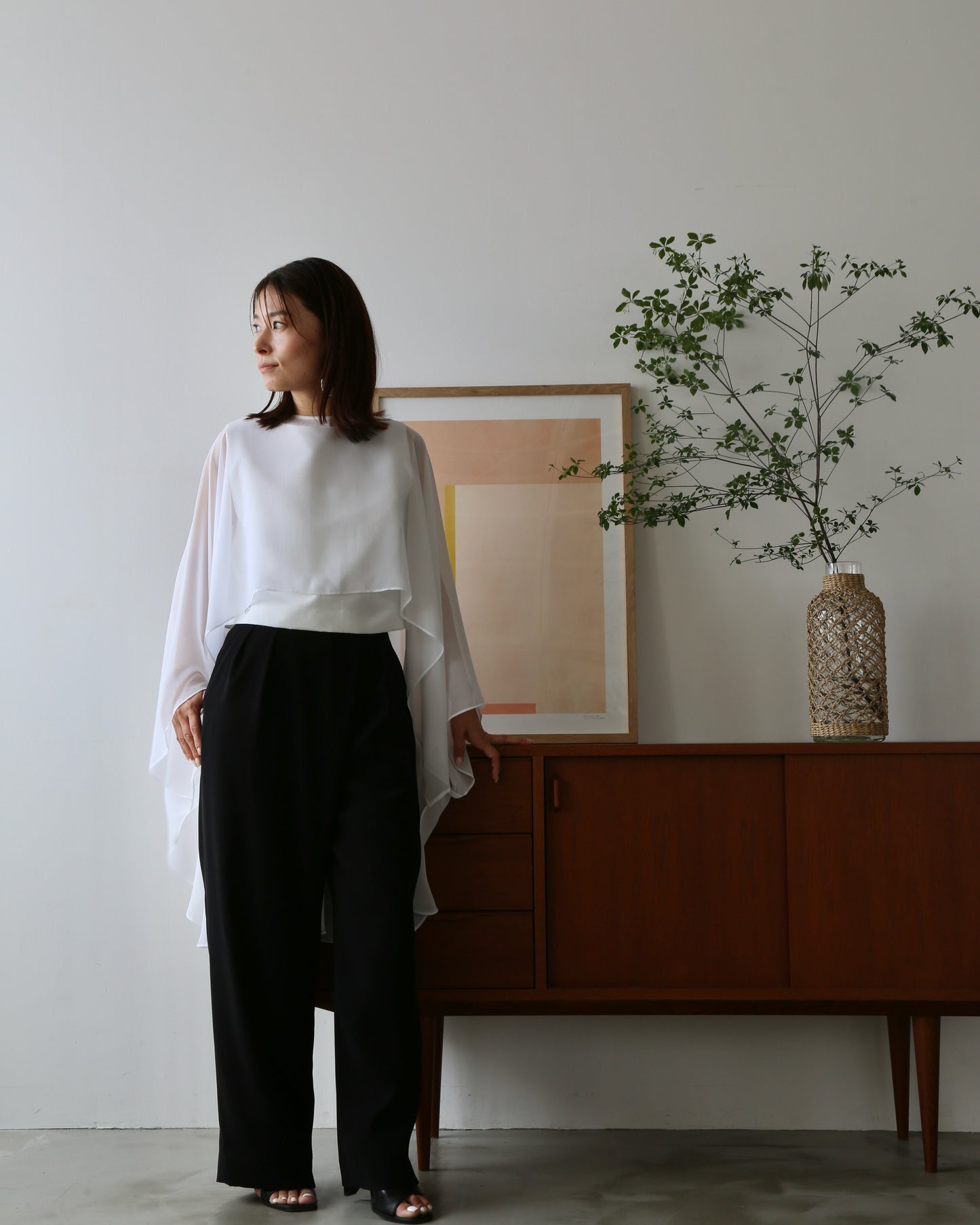 Plume cape Logo top (white)