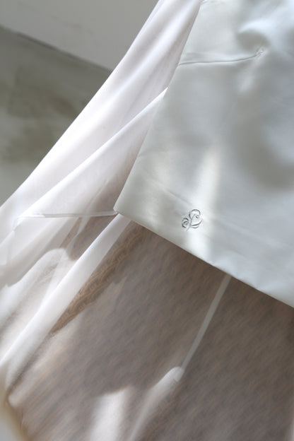 Plume cape Logo top (white)